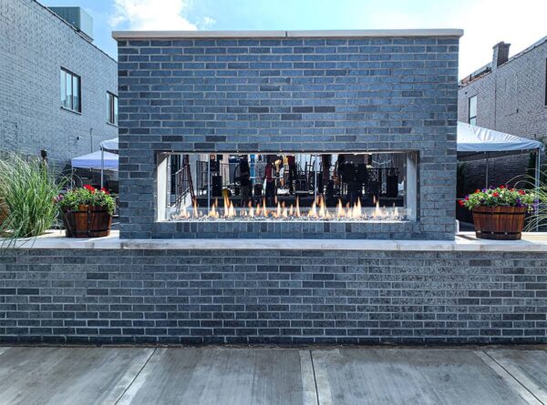 Stock Image - Flare - Outdoor See Through Flare Fireplaces Gas See-Thru Fireplace & Outdoor Fire - Builders Materials