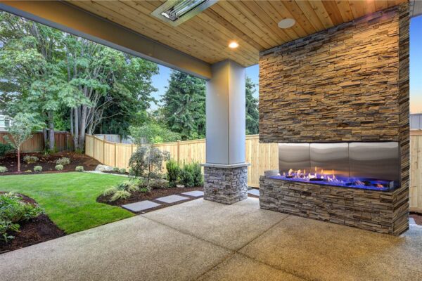 Stock Image - Flare - Outdoor Double Corner Flare Fireplaces Gas Bay Fireplace & Outdoor Fire - Builders Materials